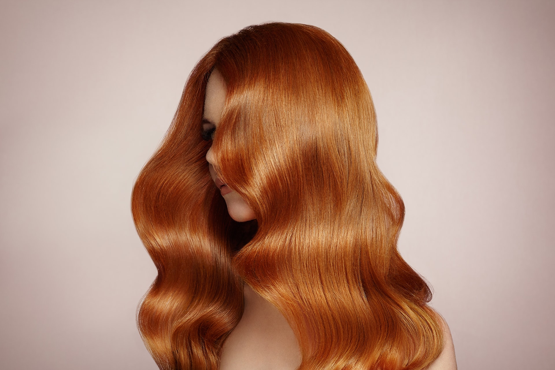 redhead-woman-with-curly-hair-EA6VCZL-min.jpg